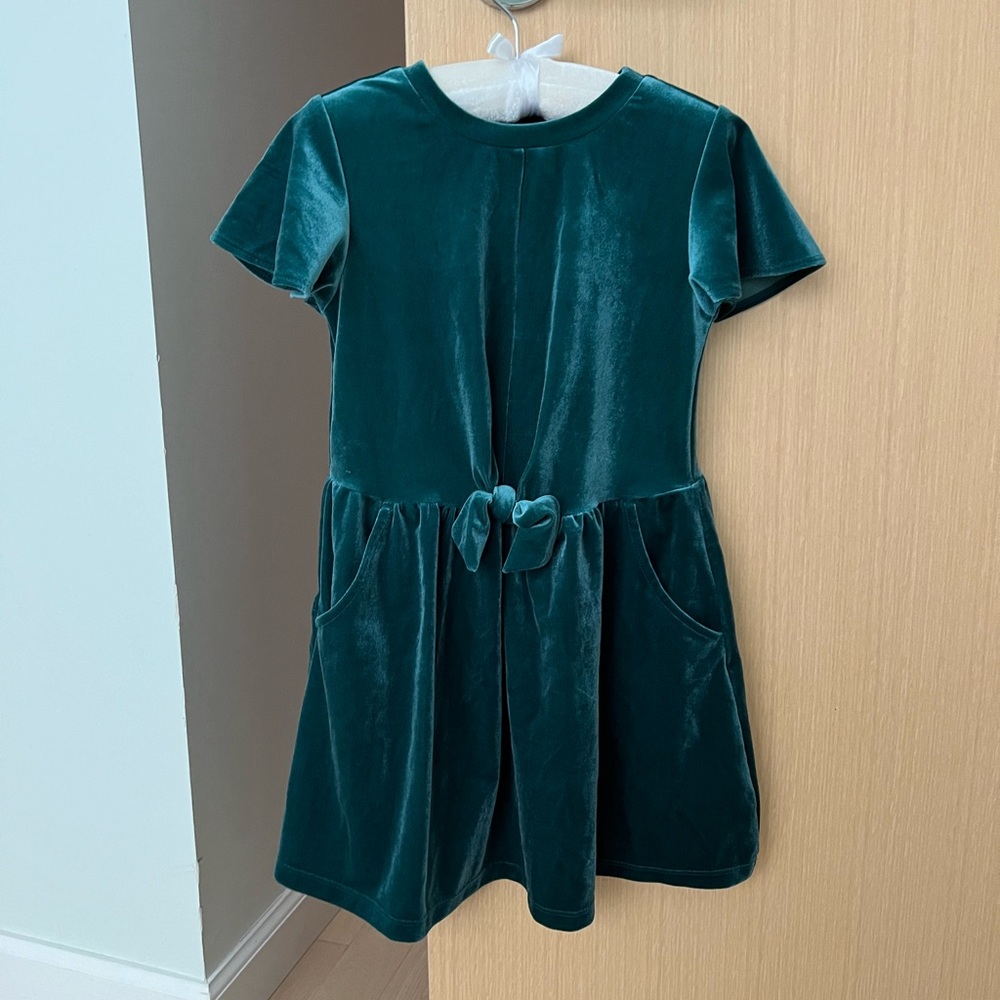 Green velvet dress with small bow detail at front waist. Size 5T